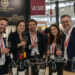 people at a wine trade exhibition